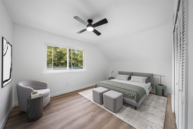 3507 Lovage Dr, Austin, TX 78727 - bedroom featuring wood finished floors, lofted ceiling, and ceiling fan