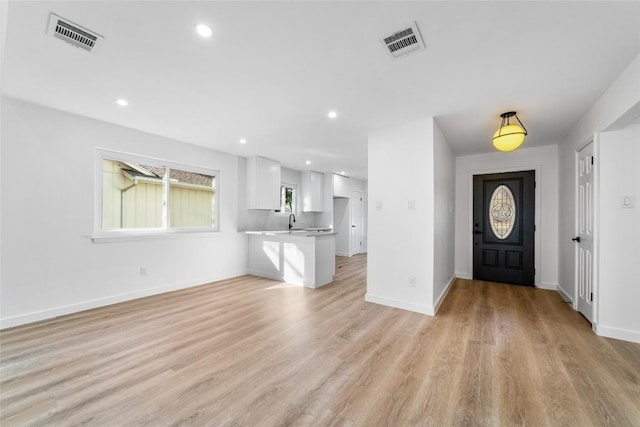 3507 Lovage Dr, Austin, TX 78727 - foyer featuring light wood-style floors and recessed lighting