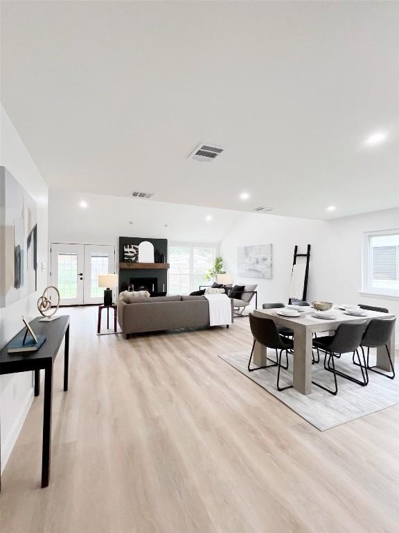 3507 Lovage Dr, Austin, TX 78727 - dining space with light wood-style flooring, healthy amount of natural light, recessed lighting, and french doors