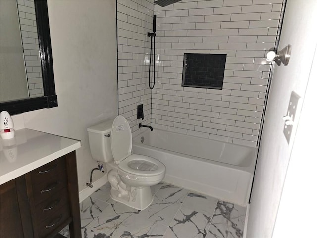 full bathroom with tiled shower / bath combo, vanity, and toilet