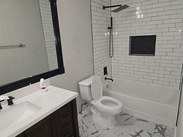 full bathroom with vanity, toilet, and tiled shower / bath