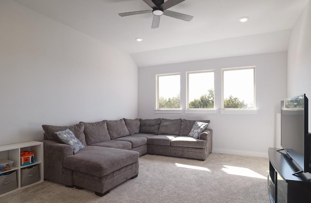 living area featuring lofted ceiling, recessed lighting, a ceiling fan, light carpet, and baseboards