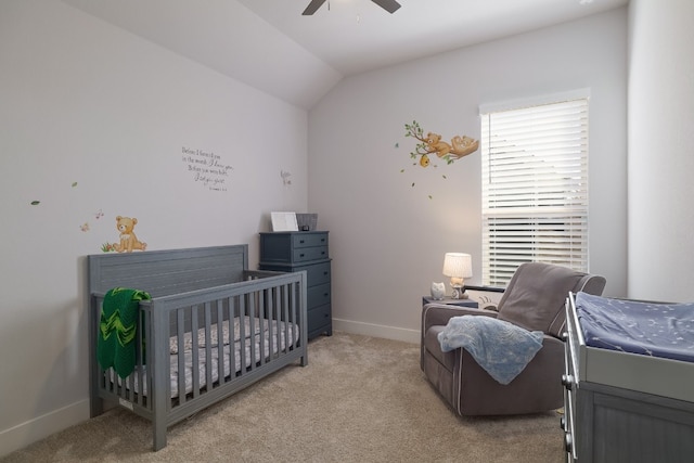 bedroom featuring lofted ceiling, ceiling fan, baseboards, and light colored carpet