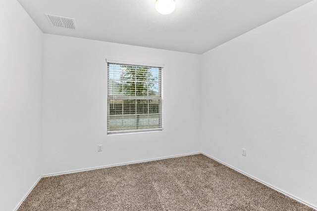3201 Fresh Spring Rd, Pflugerville, TX 78660 - unfurnished room featuring carpet flooring and baseboards