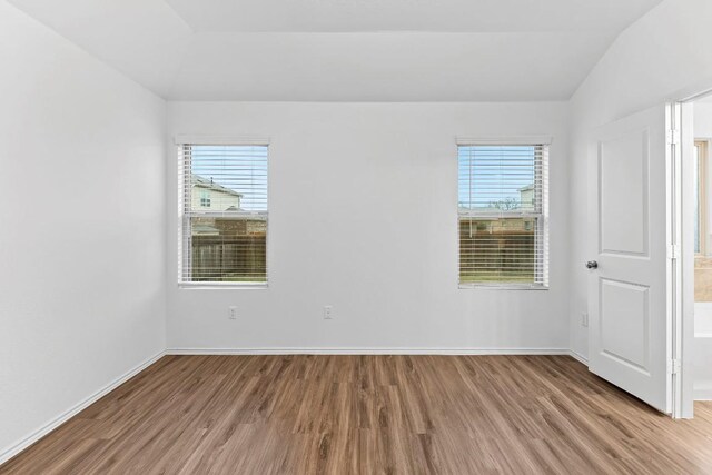 3201 Fresh Spring Rd, Pflugerville, TX 78660 - spare room featuring wood finished floors and baseboards