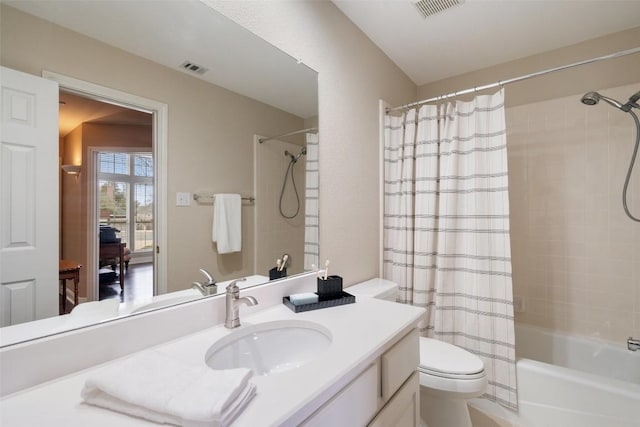 full bathroom featuring vanity, toilet, and shower / bath combo with shower curtain