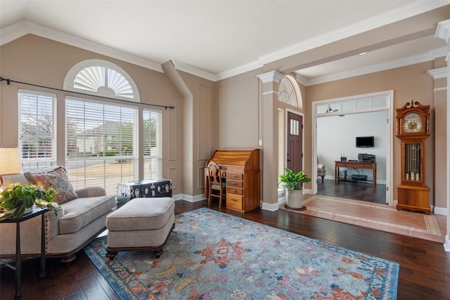 living room featuring ornate columns, ornamental molding, and dark hardwood / wood-style flooring