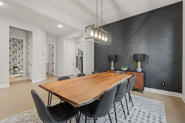 208 Tovas Secret Cv, Georgetown, TX 78628 - dining room featuring recessed lighting, light wood-type flooring, and wallpapered walls