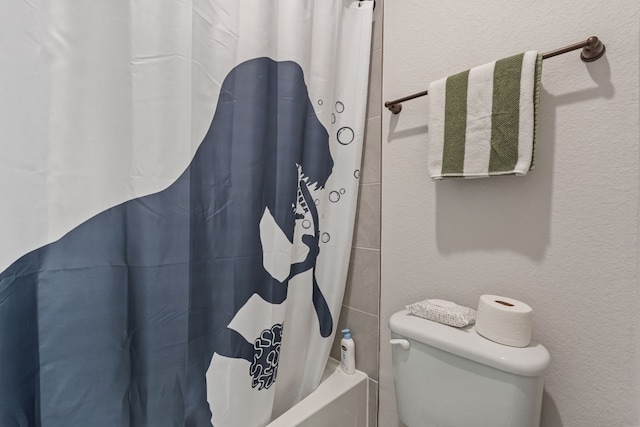 208 Tovas Secret Cv, Georgetown, TX 78628 - bathroom featuring shower / tub combo with curtain and toilet