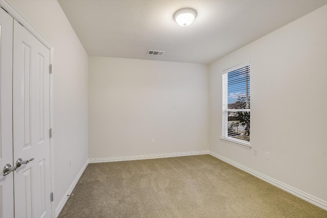 317 Yellow Rose Trl, Georgetown, TX 78633 - carpeted spare room featuring baseboards