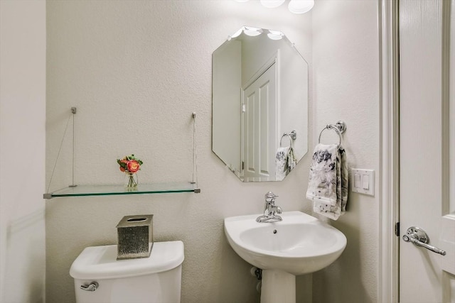 317 Yellow Rose Trl, Georgetown, TX 78633 - half bath featuring toilet and a sink