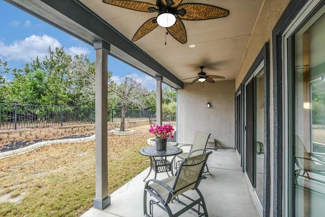 317 Yellow Rose Trl, Georgetown, TX 78633 - fenced backyard featuring a ceiling fan and a patio area