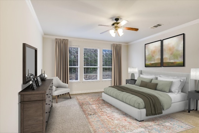 317 Yellow Rose Trl, Georgetown, TX 78633 - bedroom with carpet, crown molding, ceiling fan, and baseboards