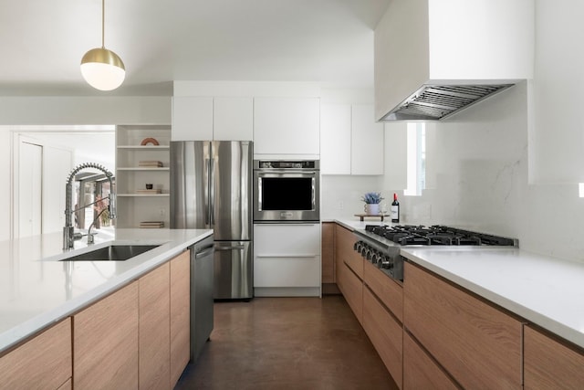 kitchen with custom exhaust hood, sink, white cabinets, and stainless steel appliances