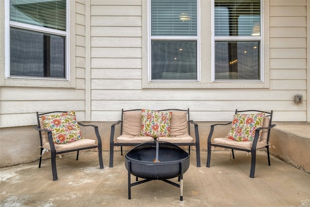 view of patio featuring a fire pit