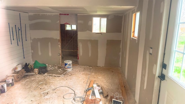 unfurnished room featuring a wealth of natural light