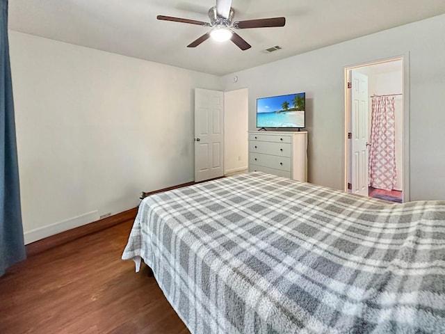 bedroom featuring hardwood / wood-style flooring and ceiling fan