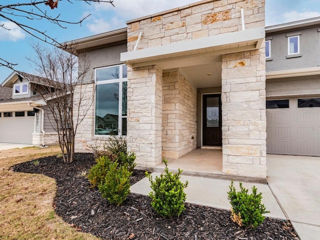 property entrance with a garage