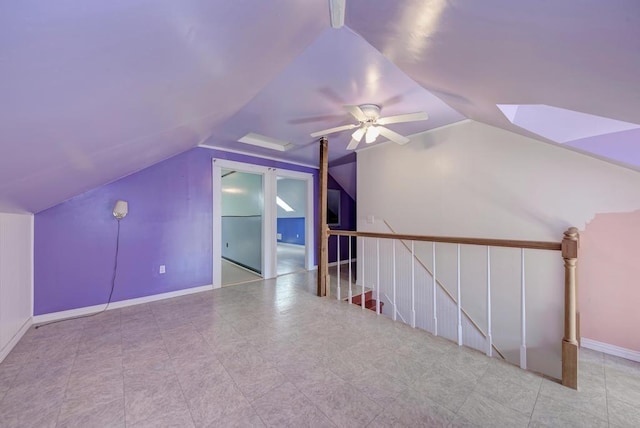 bonus room featuring ceiling fan and vaulted ceiling