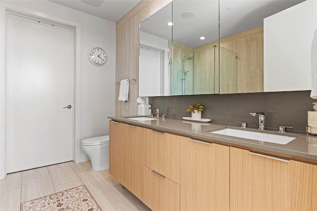 44 E Ave Unit 2310, Austin, TX 78701 - full bath featuring a shower stall, double vanity, and toilet
