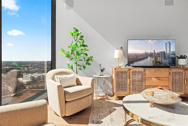 44 E Ave Unit 2310, Austin, TX 78701 - sitting room with wood finished floors