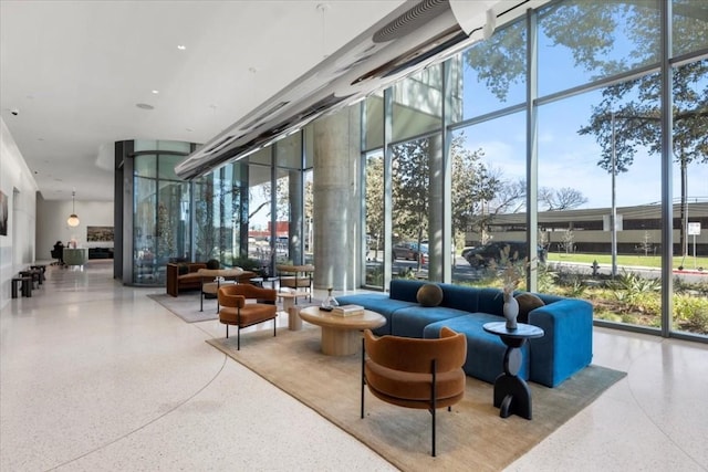44 E Ave Unit 2310, Austin, TX 78701 - lobby featuring expansive windows and a high ceiling