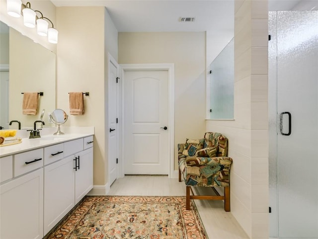 115 Lafayette St, Georgetown, TX 78633 - full bathroom featuring vanity, a stall shower, and baseboards