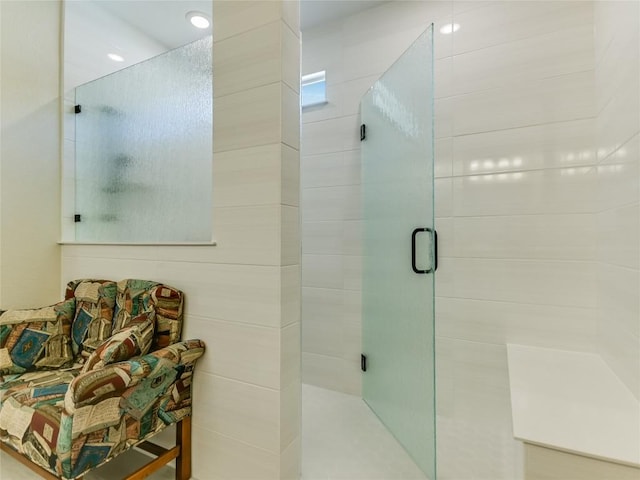 bathroom featuring an enclosed shower