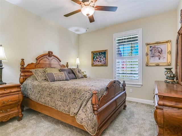 115 Lafayette St, Georgetown, TX 78633 - bedroom with light colored carpet, baseboards, and a ceiling fan
