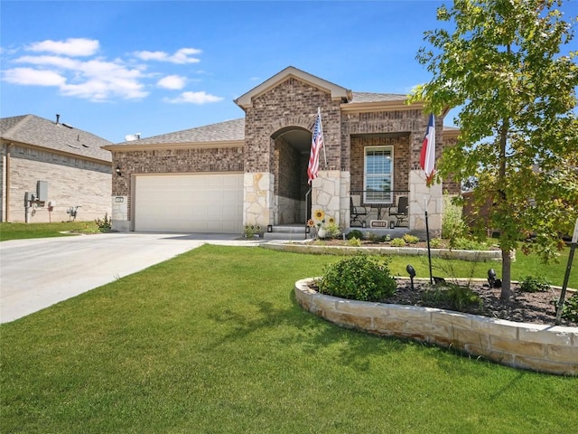 115 Lafayette St, Georgetown, TX 78633 - view of front of house with brick siding, an attached garage, a front yard, and concrete driveway
