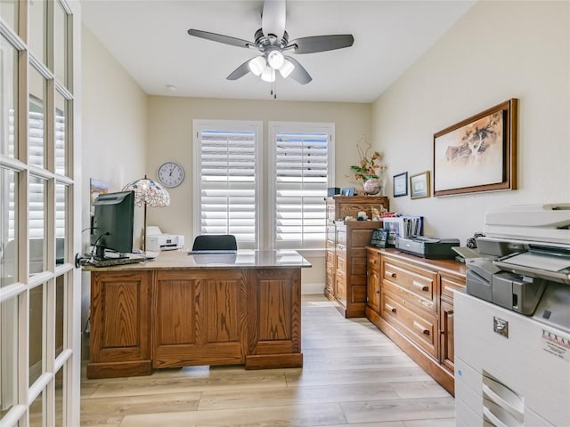 office space with ceiling fan, light wood-type flooring, and french doors