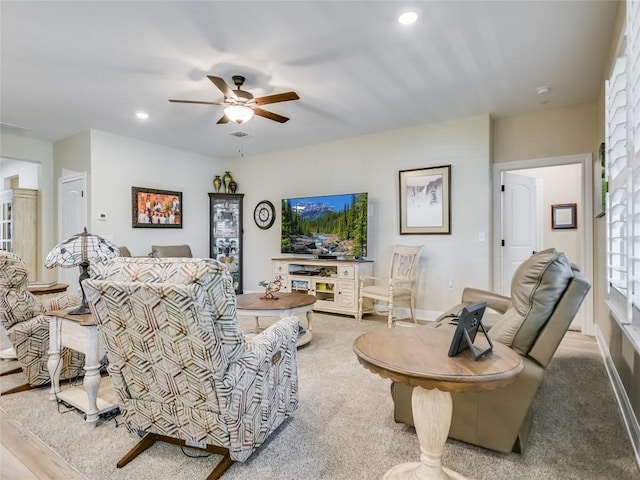 115 Lafayette St, Georgetown, TX 78633 - carpeted living area featuring a ceiling fan, recessed lighting, and baseboards