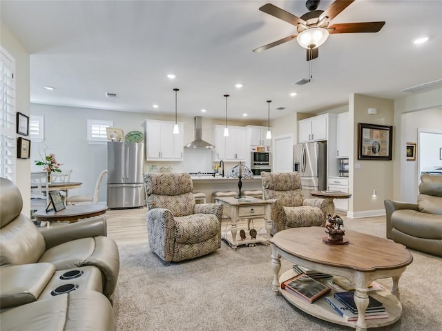 115 Lafayette St, Georgetown, TX 78633 - living room featuring ceiling fan, recessed lighting, baseboards, and light wood-type flooring