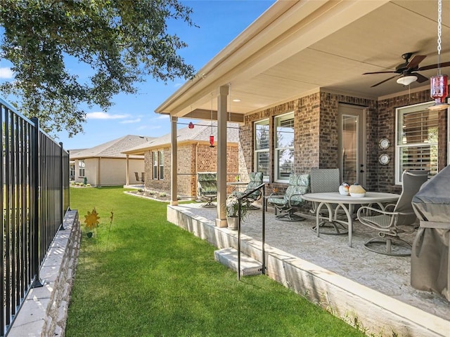 115 Lafayette St, Georgetown, TX 78633 - view of green lawn featuring ceiling fan and a patio