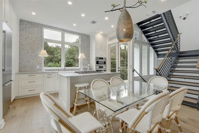 dining area featuring light hardwood / wood-style flooring