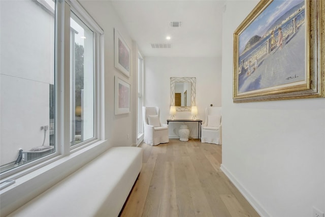 hallway featuring light hardwood / wood-style floors