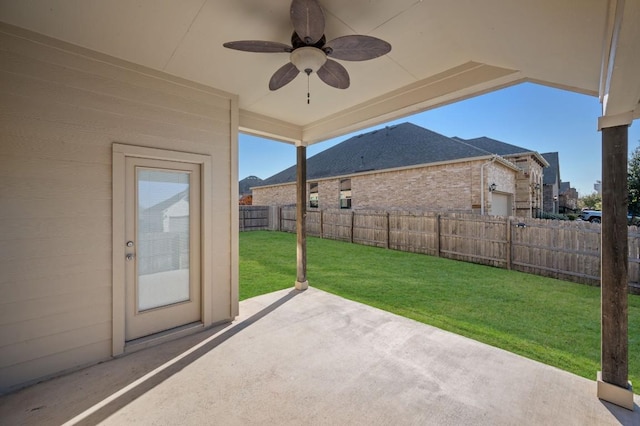 view of patio featuring ceiling fan