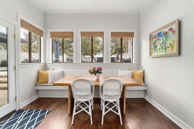 sunroom featuring breakfast area