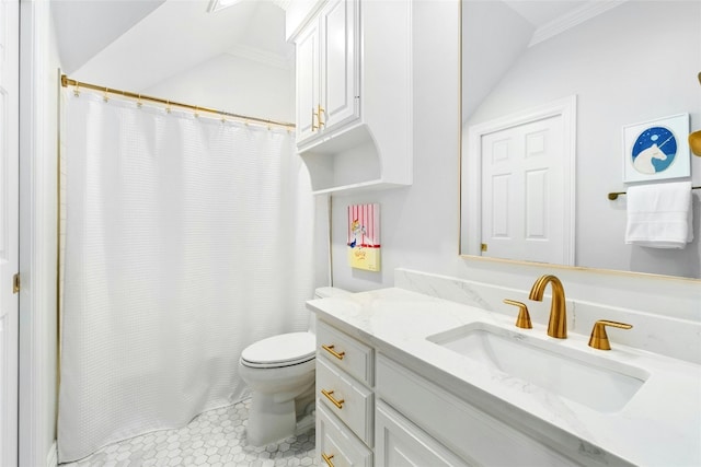 bathroom with tile patterned floors, vanity, toilet, and vaulted ceiling