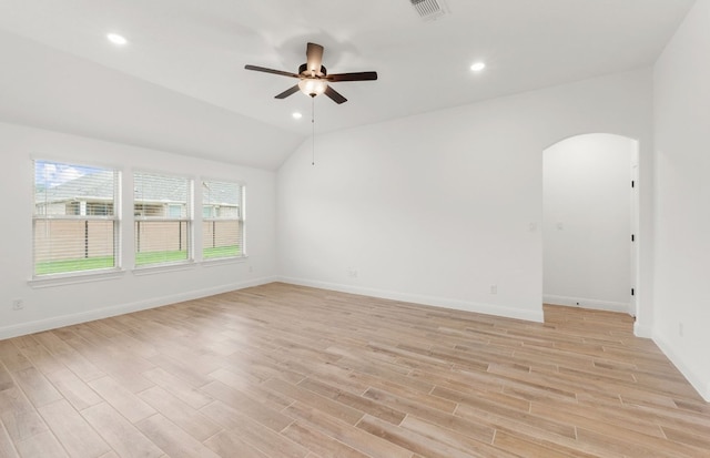 237 Silver Ridge Dr, Georgetown, TX 78633 - empty room with ceiling fan, arched walkways, light wood-style floors, baseboards, and recessed lighting