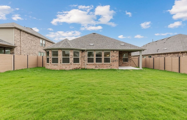 237 Silver Ridge Dr, Georgetown, TX 78633 - rear view of house with a patio area, brick siding, and a shingled roof