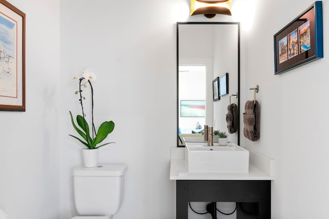 bathroom with a sink and toilet