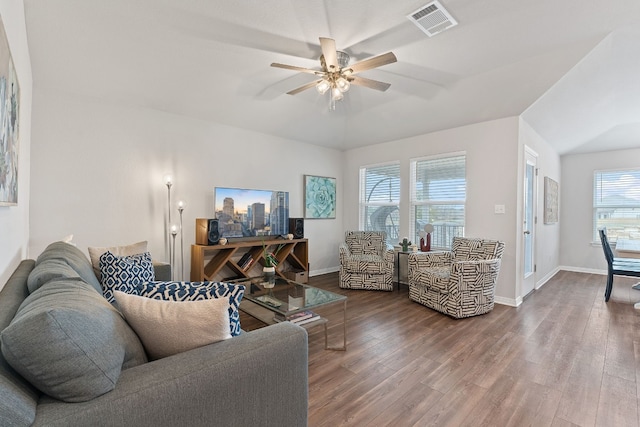 living room with wood-type flooring, ceiling fan, and vaulted ceiling