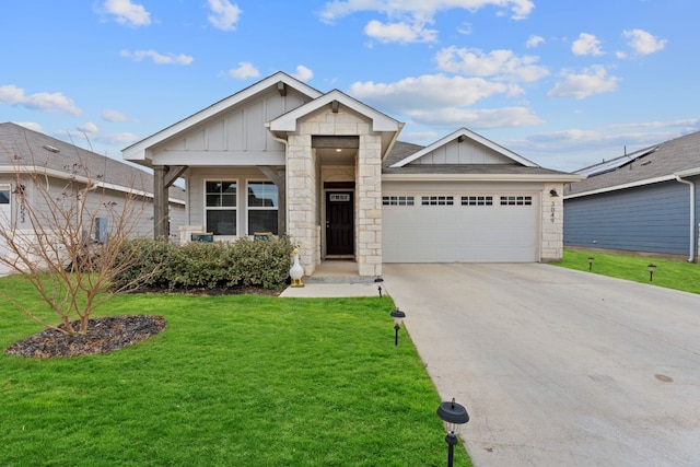 view of front of property with a garage and a front yard