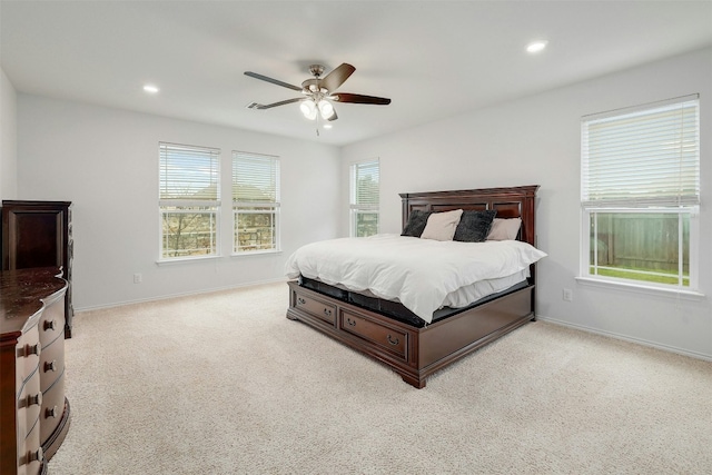 1228 Brenham Ln, Leander, TX 78641 - bedroom with light colored carpet, baseboards, recessed lighting, and ceiling fan