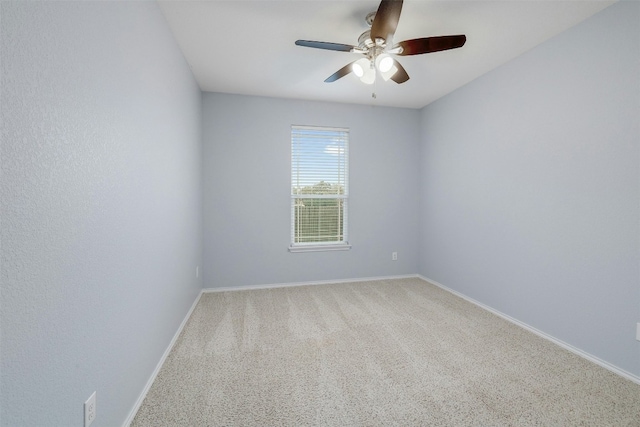 1228 Brenham Ln, Leander, TX 78641 - spare room featuring ceiling fan, carpet floors, and baseboards