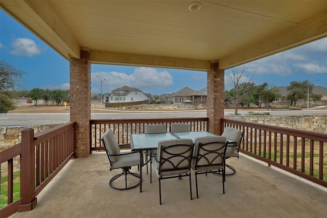 1228 Brenham Ln, Leander, TX 78641 - view of patio with a residential view and outdoor dining area
