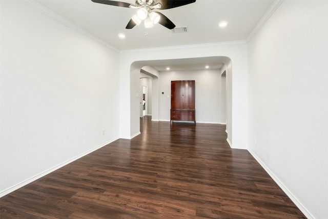 1228 Brenham Ln, Leander, TX 78641 - spare room with arched walkways, a ceiling fan, dark wood finished floors, baseboards, and recessed lighting