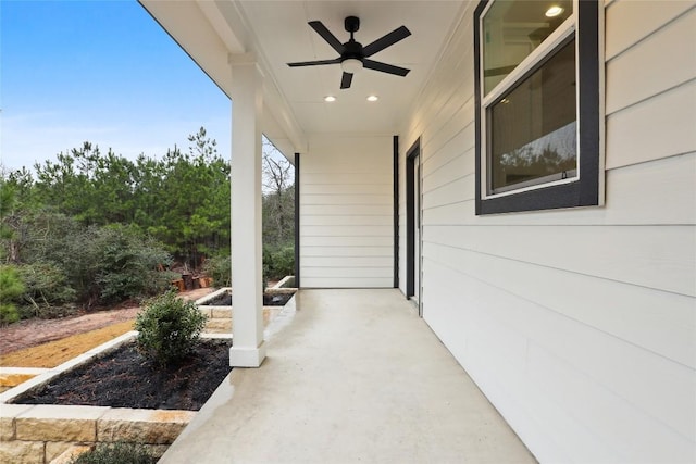 view of patio / terrace featuring ceiling fan