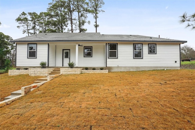 single story home featuring a front lawn and covered porch